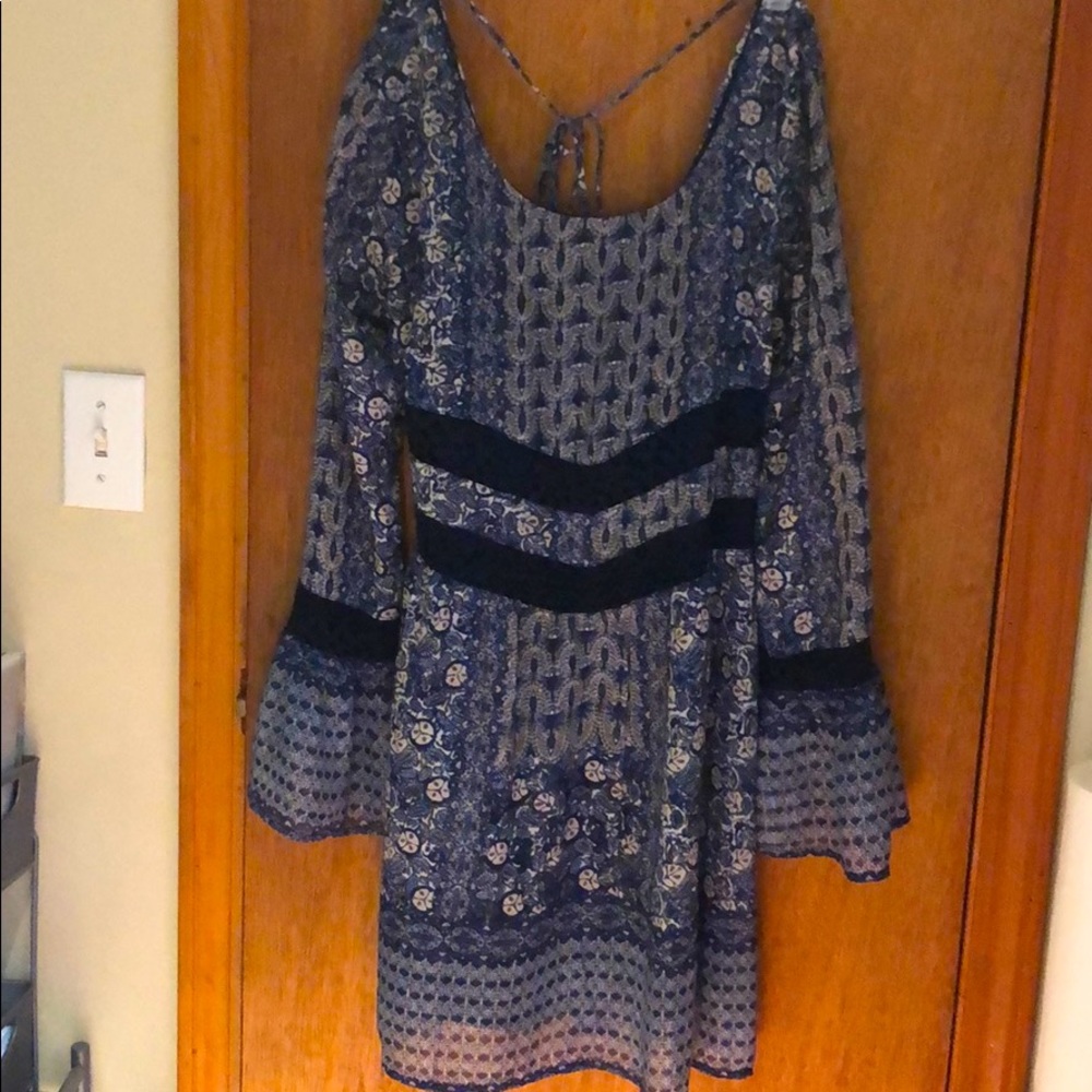 Blue, floral dress with waist embroidery.
